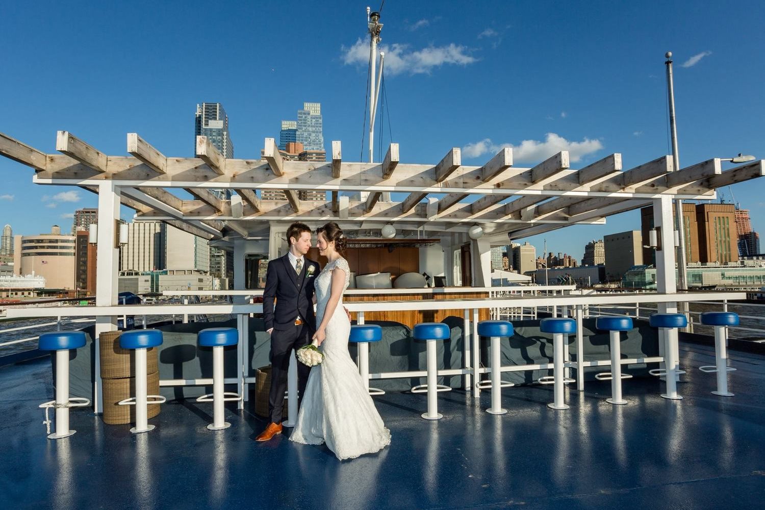 World Yacht Cruises boat on the rooftop with a wedding couple.